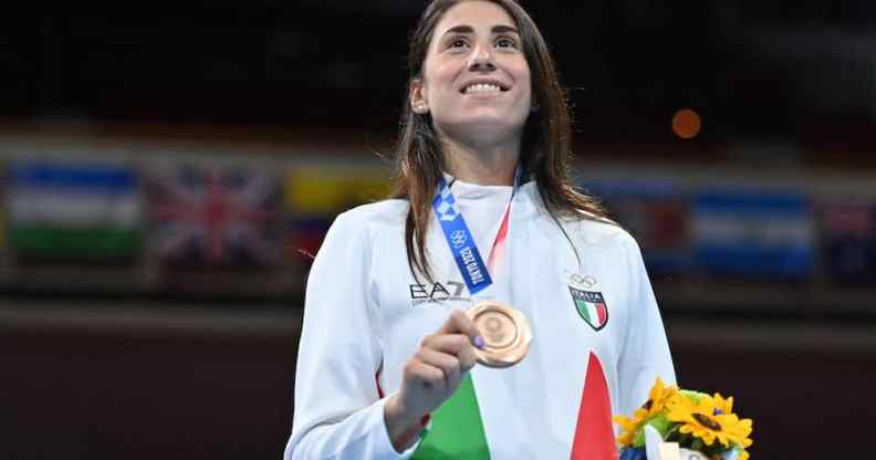 Bronze medallist Italy's Irma Testa poses on the podium with her medal