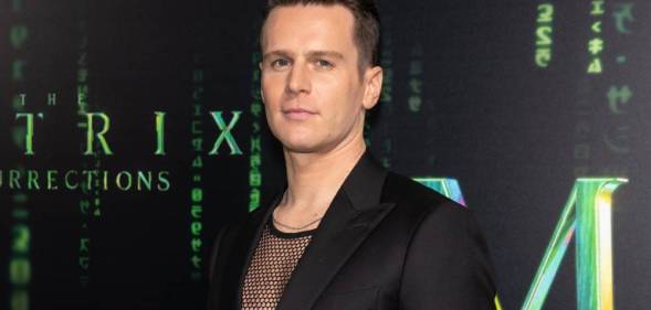 Jonathan Groff arrived at the Matrix Resurrections in a black fishnet shirt and a black suit jacket