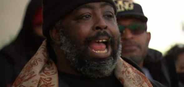 Jawhar Edwards talks at a rally