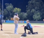 Woman pops the question to fiancée by faking softball injury in “epic proposal”
