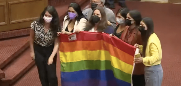 Members of Chile's congress pose for a photo after the historic same-sex marriage vote