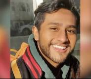 A picture of Suraj Mahadeva smiling at the camera