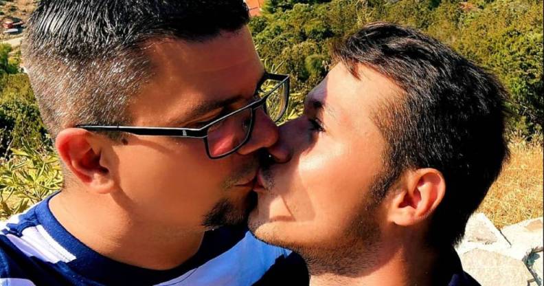 Domagoj Hajdukovic and Matija Stainer share an adorable kiss in front of a beautiful seaside view