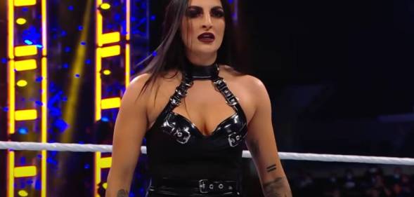 Sonya Deville performs during a WWE match against fellow wrestlers Naomi and “The Protector” Xia Li