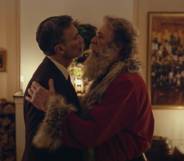 a screenshot of Santa Claus embracing a man in an advert for Postem