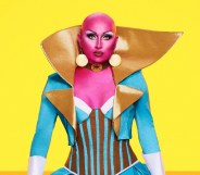 Maddy Morphosis, a bald drag queen covered in pink paint