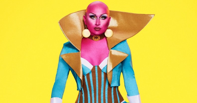 Maddy Morphosis, a bald drag queen covered in pink paint