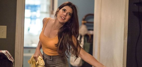 Marisa Tomei as May.