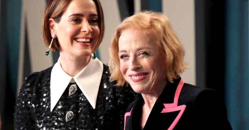 Sarah Paulson and Holland Taylor are seen smiling at the camera while attending the 2020 Vanity Fair Oscar party