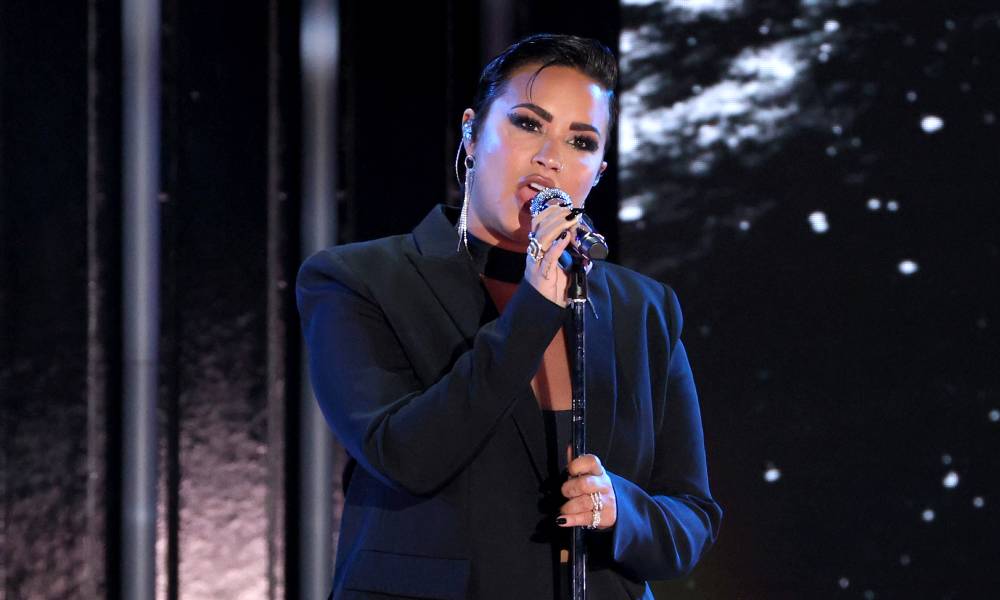 Demi Lovato holds 'funeral' for their pop music
