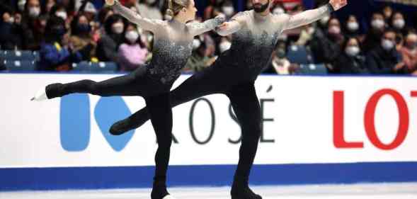 Figure skaters Ashley Cain-Gribble and Timothy LeDuc wear monochromatic ombre skating outfits while competing at the ISU Grand Prix of Figure Skating