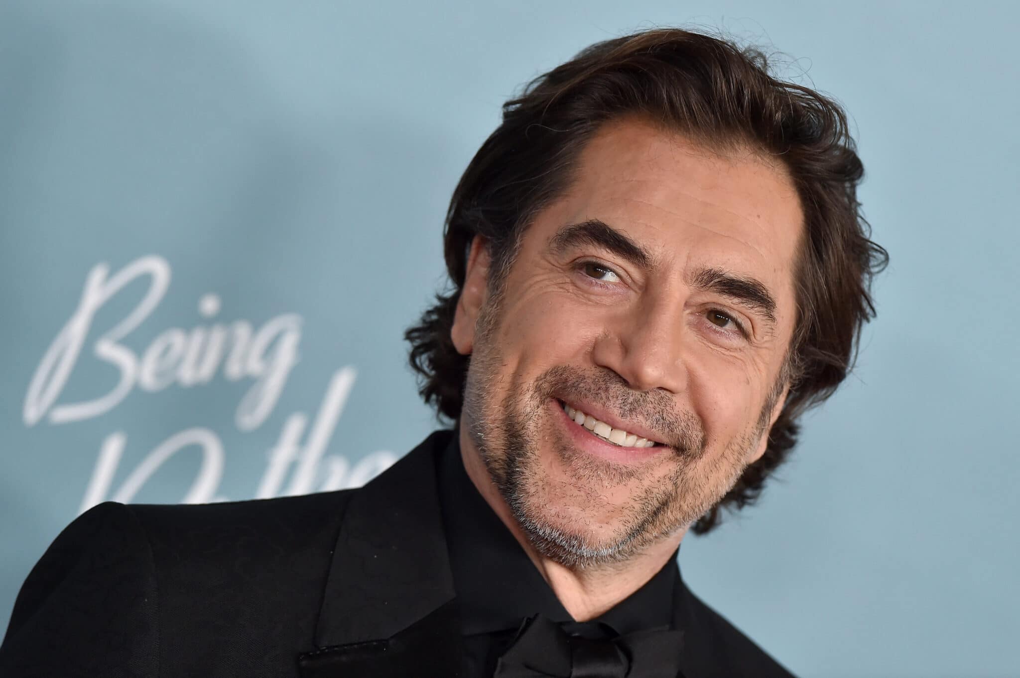 Javier Bardem jumped out of a cake in drag for Daniel Craig