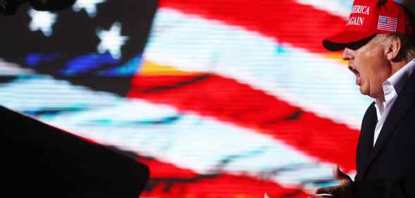 Donald Trump prepares to speak at a rally at the Canyon Moon Ranch festival grounds on January 15, 2022 in Florence, Arizon