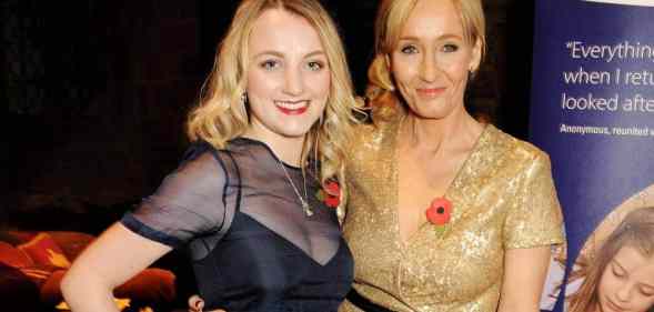 Evanna Lynch and J.K. Rowling smile at the camera while attending a fundraising event