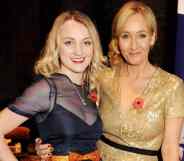 Evanna Lynch and J.K. Rowling smile at the camera while attending a fundraising event