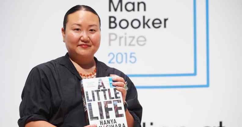 Hanya Yanagihara holding her book A Little Life