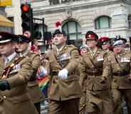 A group of UK army soldiers march in Pride in London parade