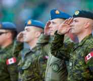 Members of the Canadian Forces salute