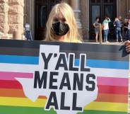 Kai Shappley holding a sign
