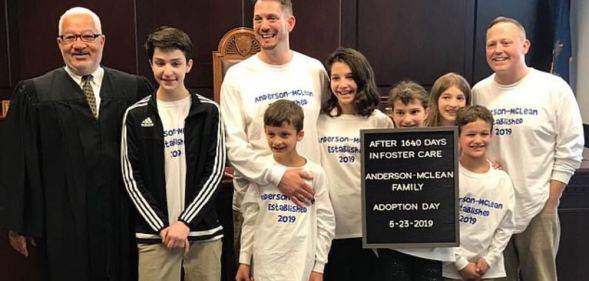 The Anderson-McLean family moments after a judge granted them adoption rights