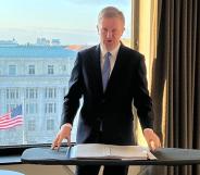 Oliver Dowden uses an ironing board to prepare for his speech to The Heritage Foundation