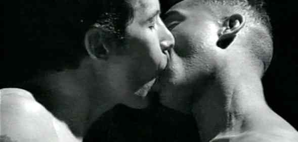 Two men kissing in a still from The Gay Men's Guide to Safer Sex. (Barbican)