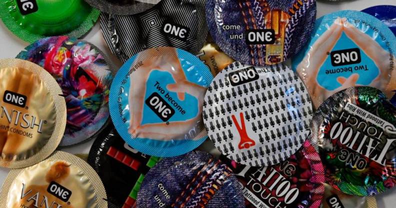 This illustration photo shows "One" condoms displayed on a table