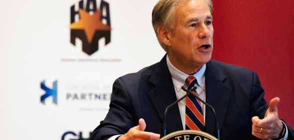 Texas Governor Greg Abbott speaks at a podium