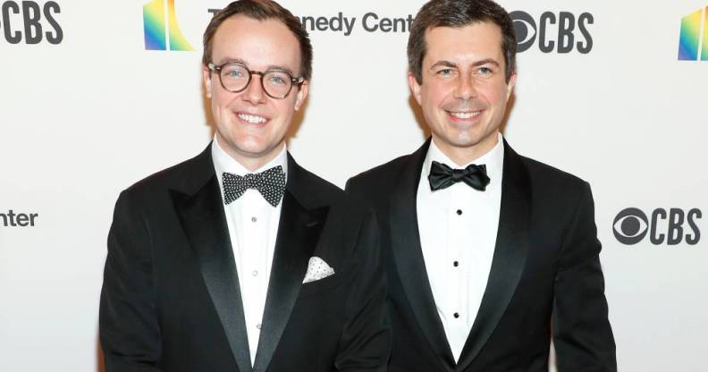 Pete and Chasten Buttigieg, who are husbands, are dressed in suits and ties for an event