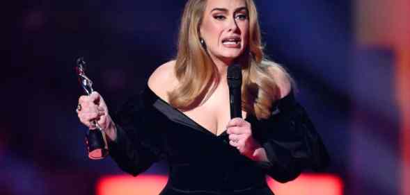 Adele accepting the Artist of the Year award at The BRIT Awards 2022.