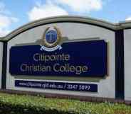 A sign for Citipointe Christian College in Australia surrounded by shrubbery