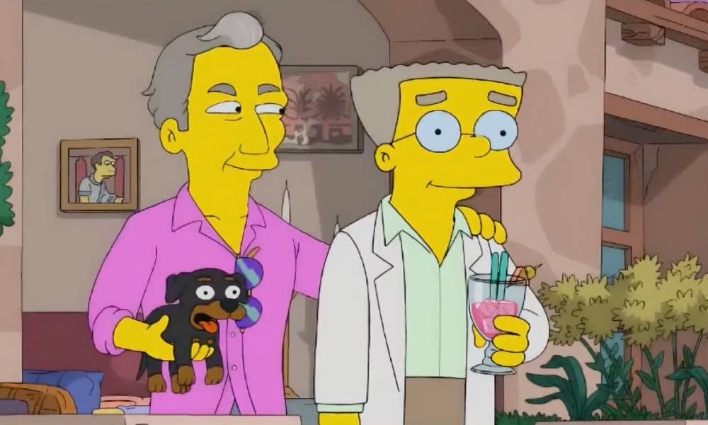 Waylon Smithers, a characters from The Simpsons, stands alongside his new boyfriend