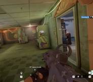 A first person perspective of a person playing the Ubisoft game Rainbow Six