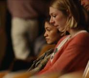 Rue (Zendaya) and Jules (Hunter Schafer) catch up in their high school's theatre in the finale of Euphoria's second season