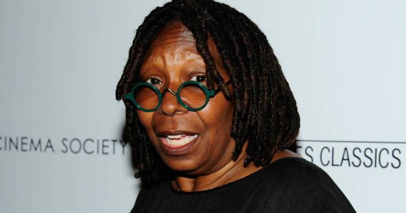 Whoopi Goldberg in round glasses and a black top
