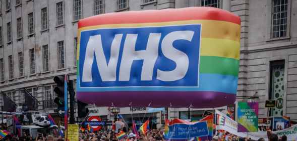 An NHS banner seen during a Pride in London parade.