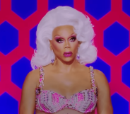 RuPaul in a bralette