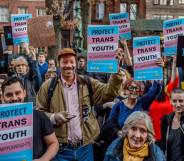 A crowd gathers in support of the trans community