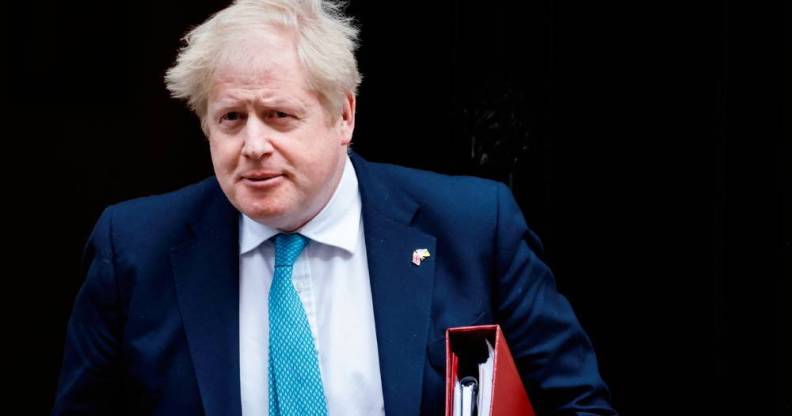 Prime Minister Boris Johnson leaves Cabinet meeting at 10 Downing Street on 23 March 2022 in order to attend the PMQ session at the House of Commons