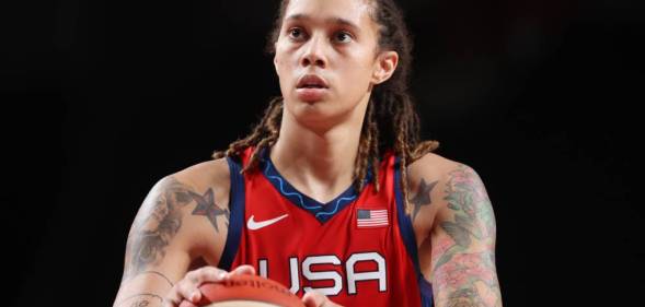 Brittney Griner, a basketball player, wears a red Team USA jersey to the 2020 Tokyo Olympics