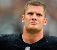 Las Vegas Raiders defensive end Carl Nassib looks on during a game against the Miami Dolphins at Allegiant Stadium