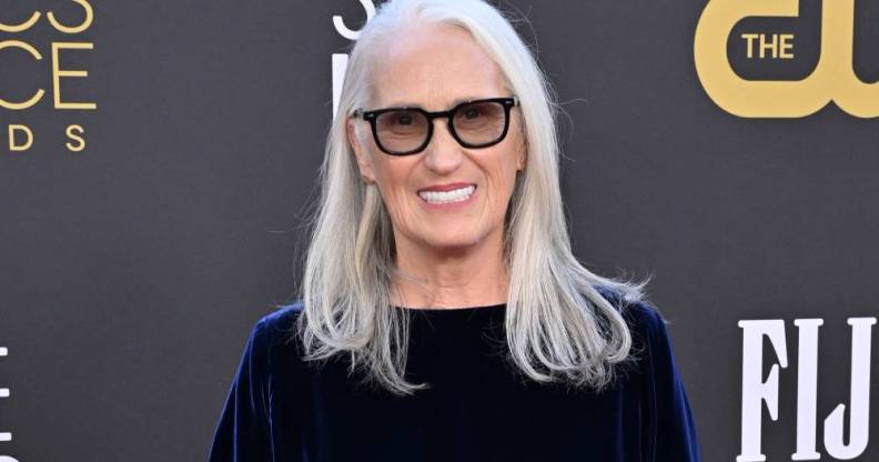 Power of the Dog director Jane Campion attends the Critics Choice Awards wearing a dark blue velvet outfit