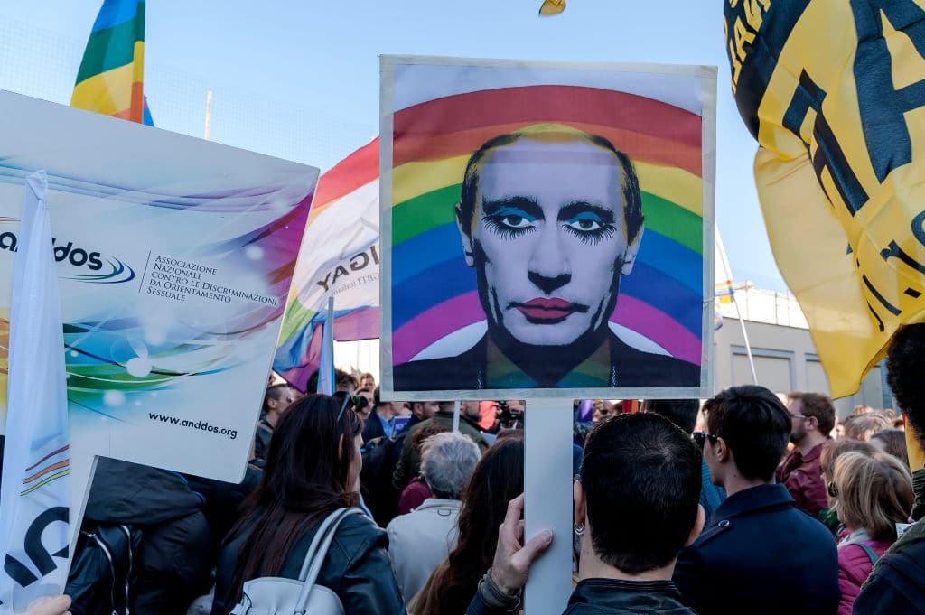 Protester hold a 'gay clown' poster of Russian President Vladimir Putin during the demonstration of LGBT Associations, in front of the Russian Embassy in Rome. The picture has been shared since the invasion of Ukraine