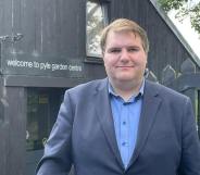 Jamie Wallis at a garden centre in 2021