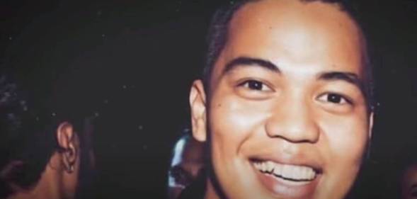 Dwayne Antojado, an Australian man, is seen in a dark club-like setting. He was later sentenced to time served as part of a scam to fund lifestyle on 'gay scene'