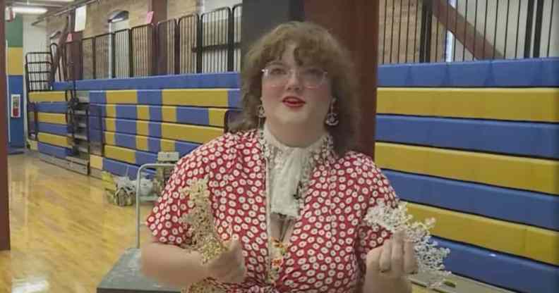 High school student holds prom crowns as she talks about her Queer Prom event to help LGBT+ youth in the local community