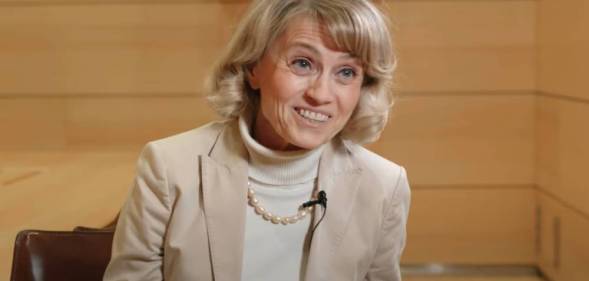 Päivi Räsänen, a Finnish MP, is seen wearing an off-white turtleneck with a cream jacket