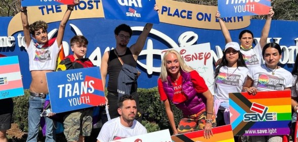Dozens of demonstrators stood outside Walt Disney World