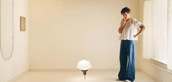 The outfit worn by Harry Styles on his Harry's House album cover is catching attention.