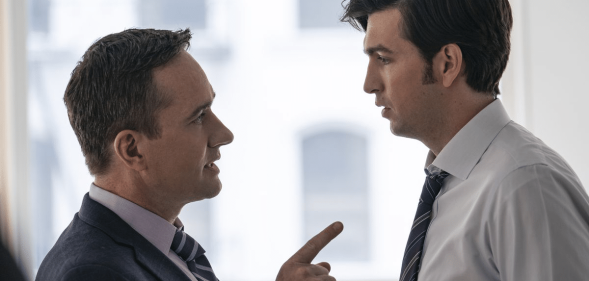 Tom pointing a stern finger at Greg